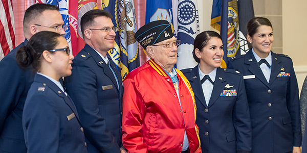 Veteran with students