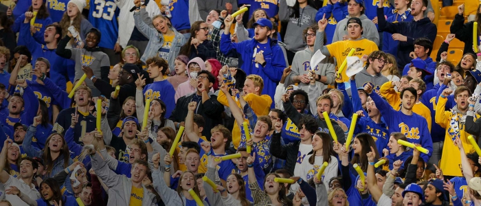 Pitt students cheer in a crowd
