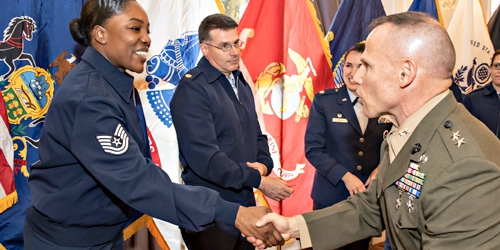 photo of military personnel shaking hands